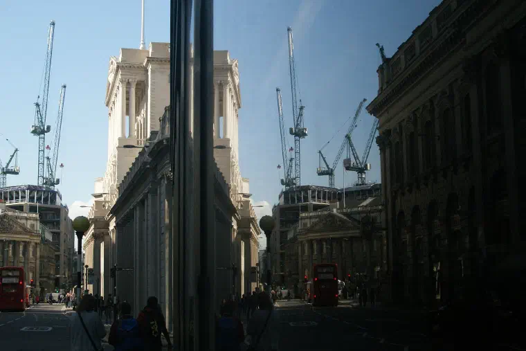 The Bank of England reflected in a neighbouring office on Threadneedle Street
